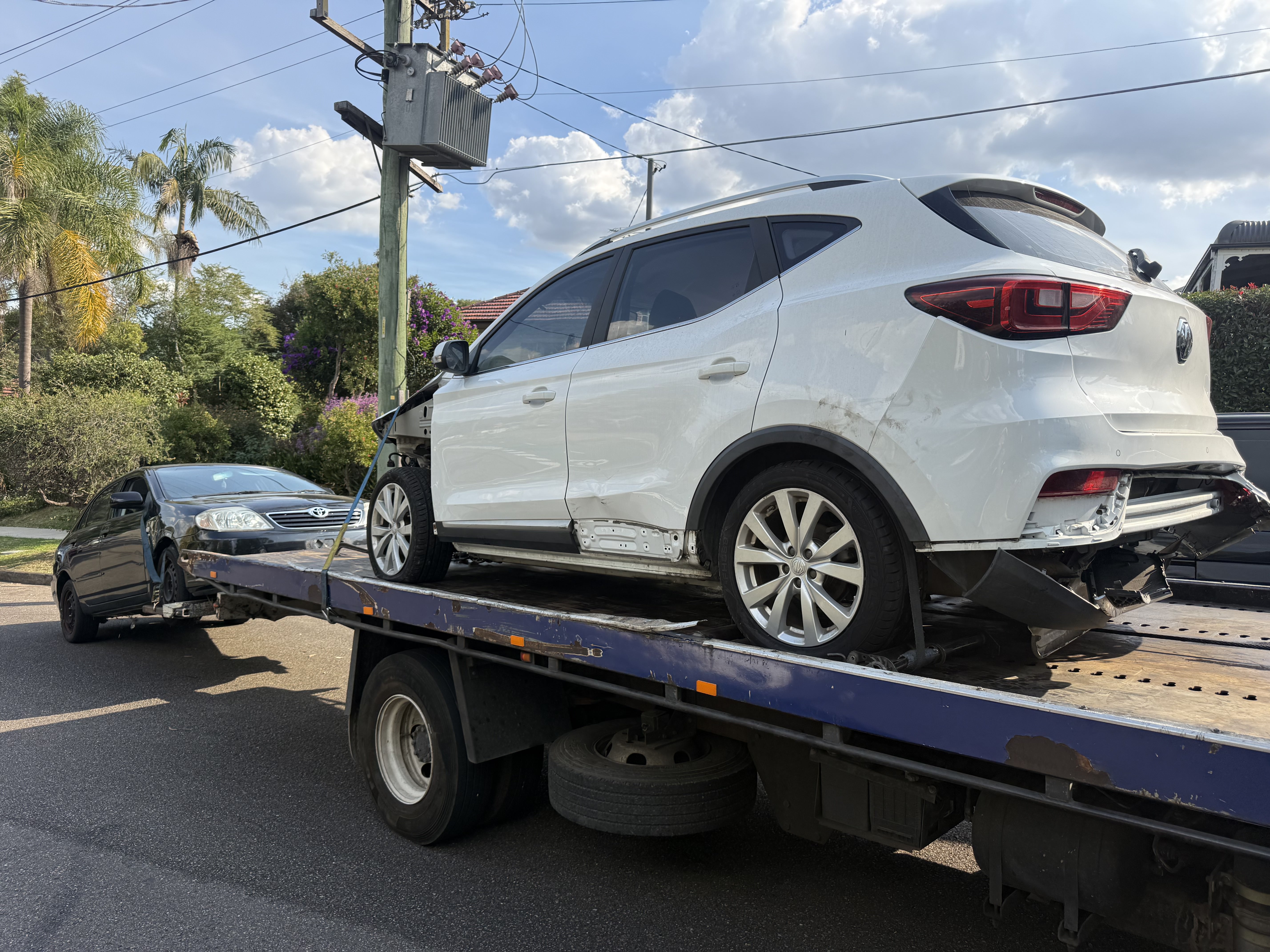 Archival photograph of a stripped old station wagon