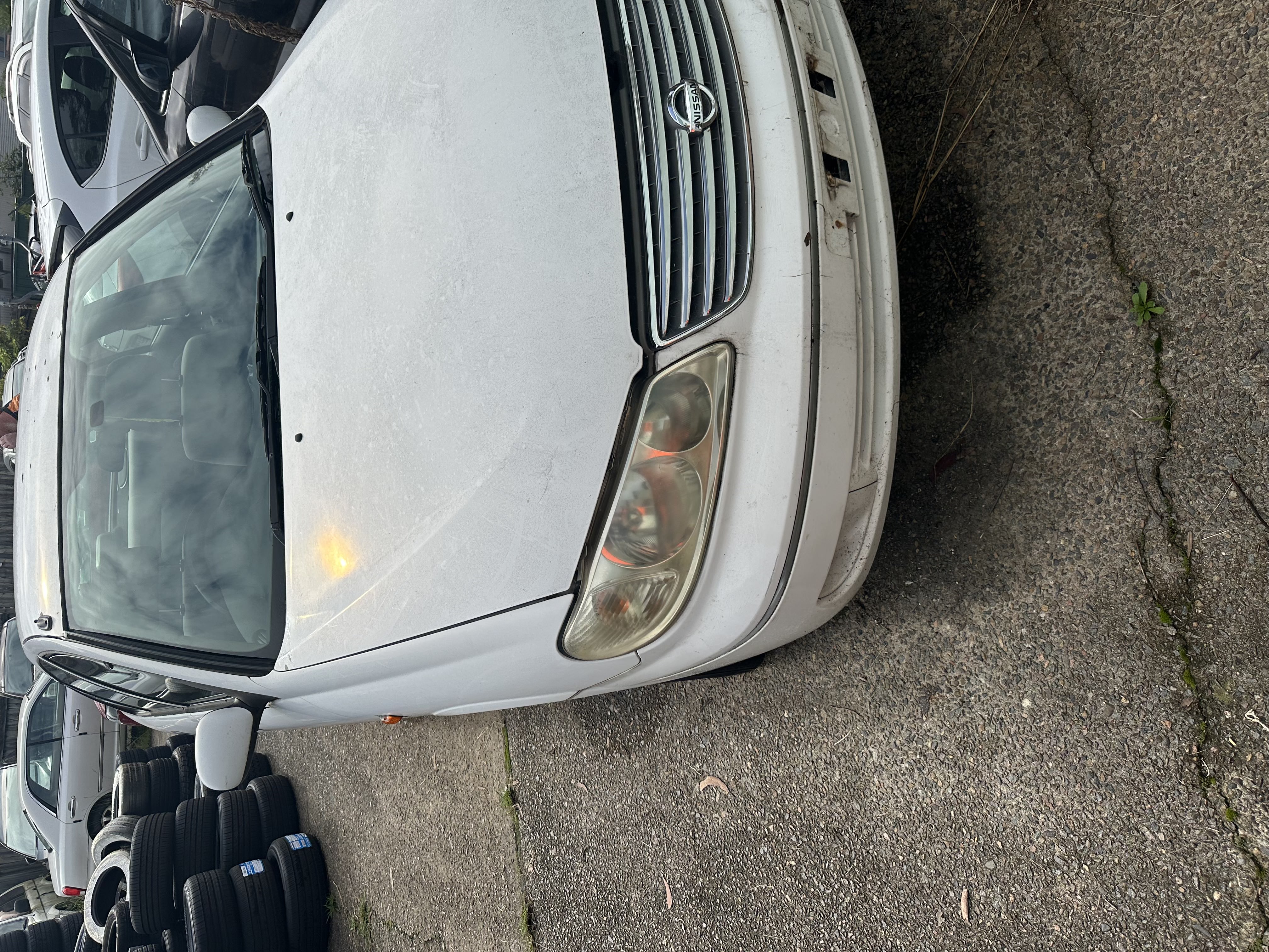 Archival photograph of a stripped old station wagon